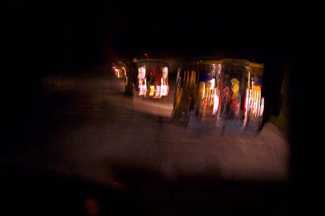 The caravan against the aerial spraying of pesticides in Davao's banana plantations navigates in the dark as it proceeds toward Cagayan de Oro City.